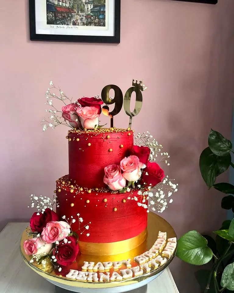 Creative 90th Birthday Cake with Red Velvet and Elegant Floral Decorations