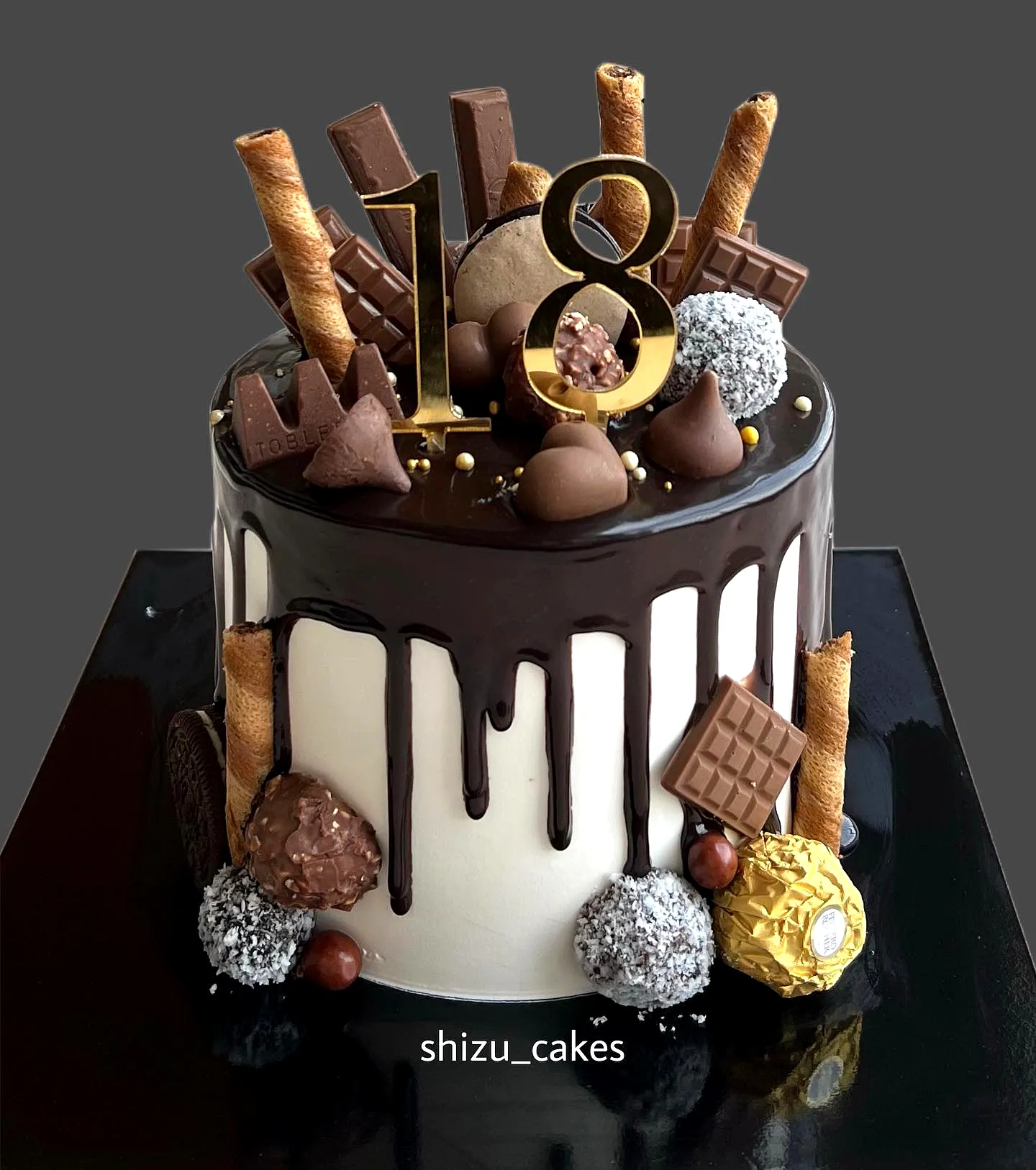 Creative chocolate birthday cake design with elegant ganache and festive decor