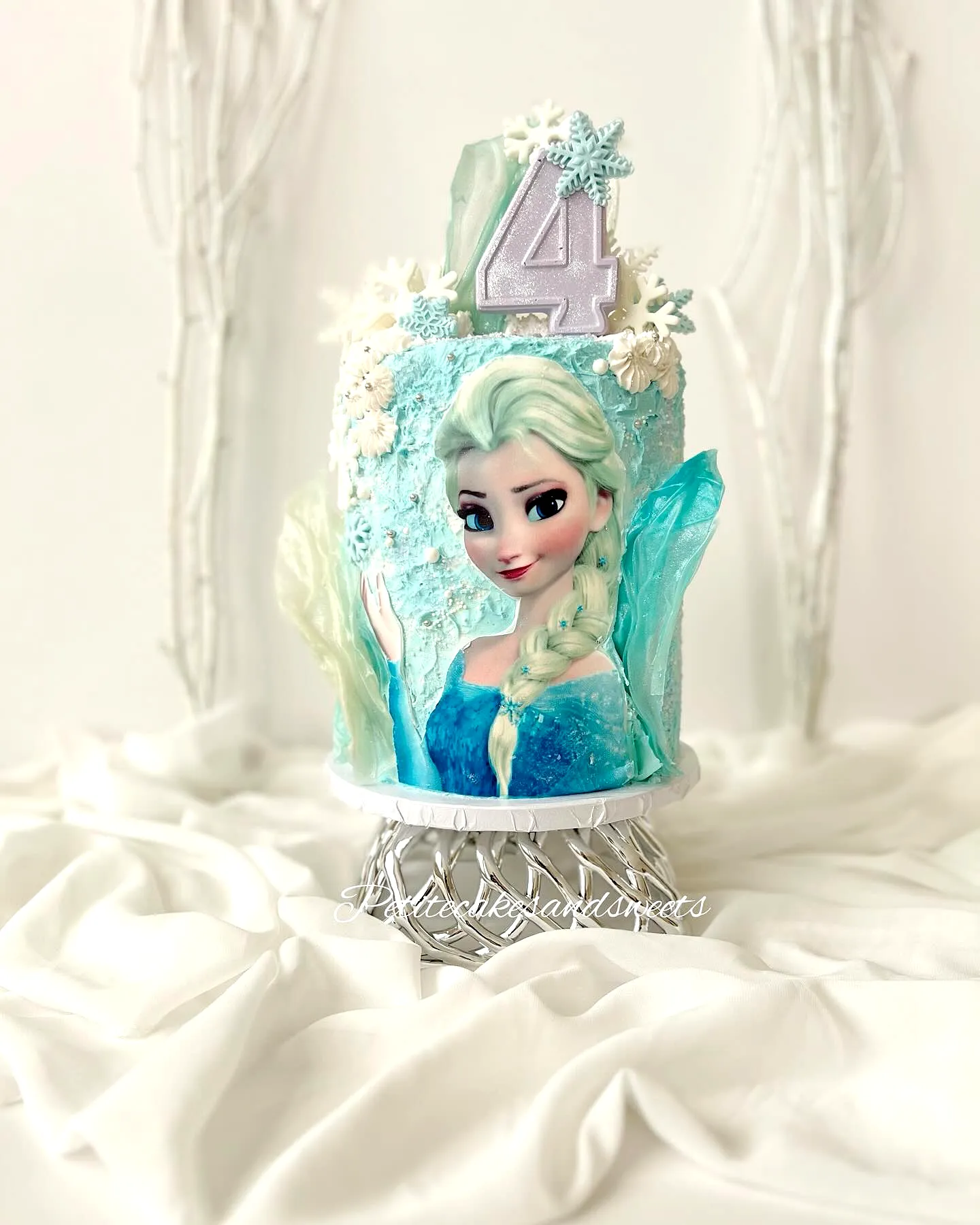 Creative frozen birthday cake design with adorable icy colors and textures