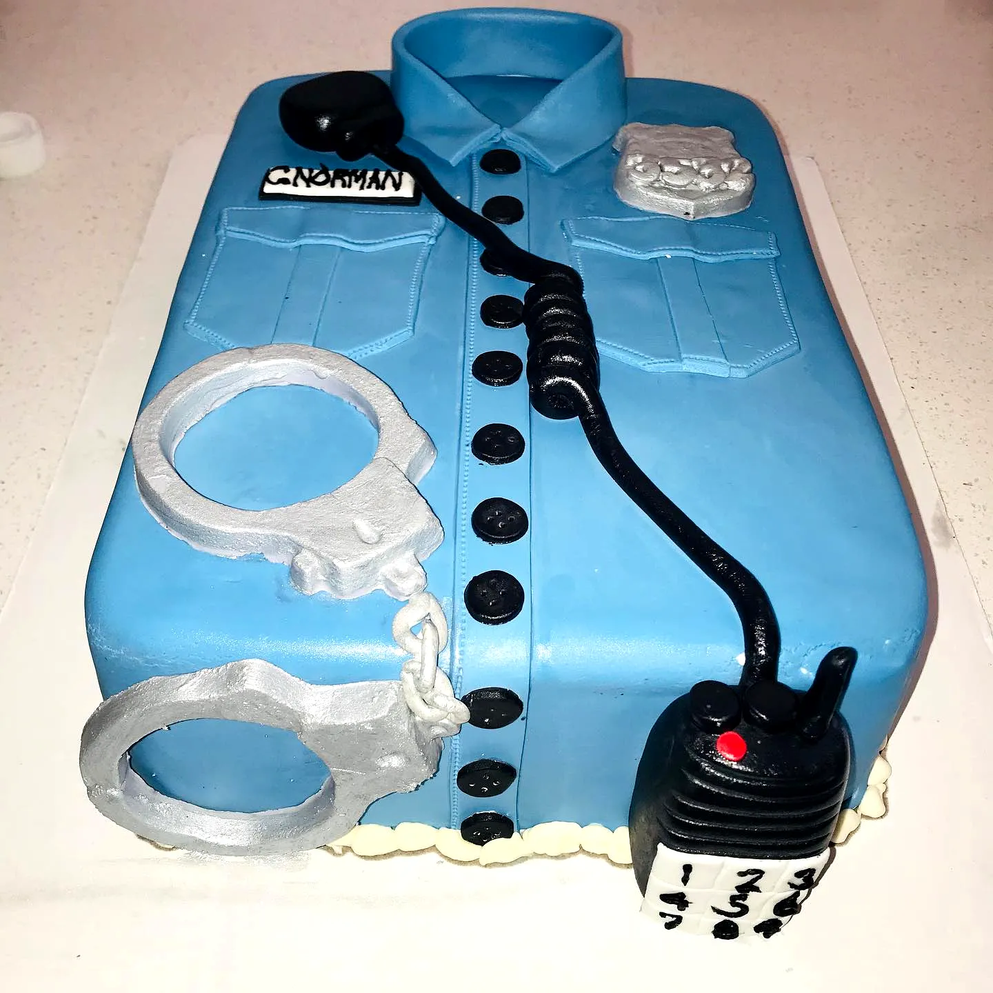 Creative Police Academy Graduation Cake Design for Celebrating Achievements