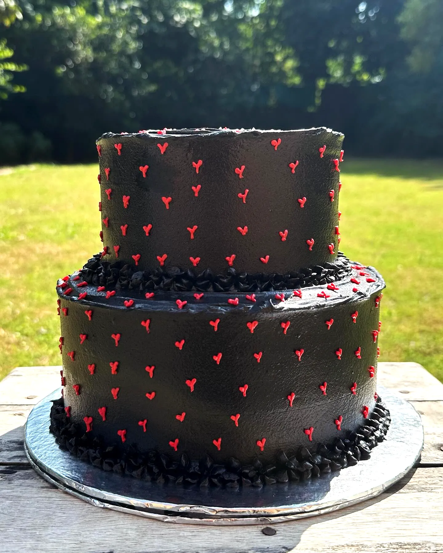 Creative Red and Black Birthday Cake Design for Bold Celebrations
