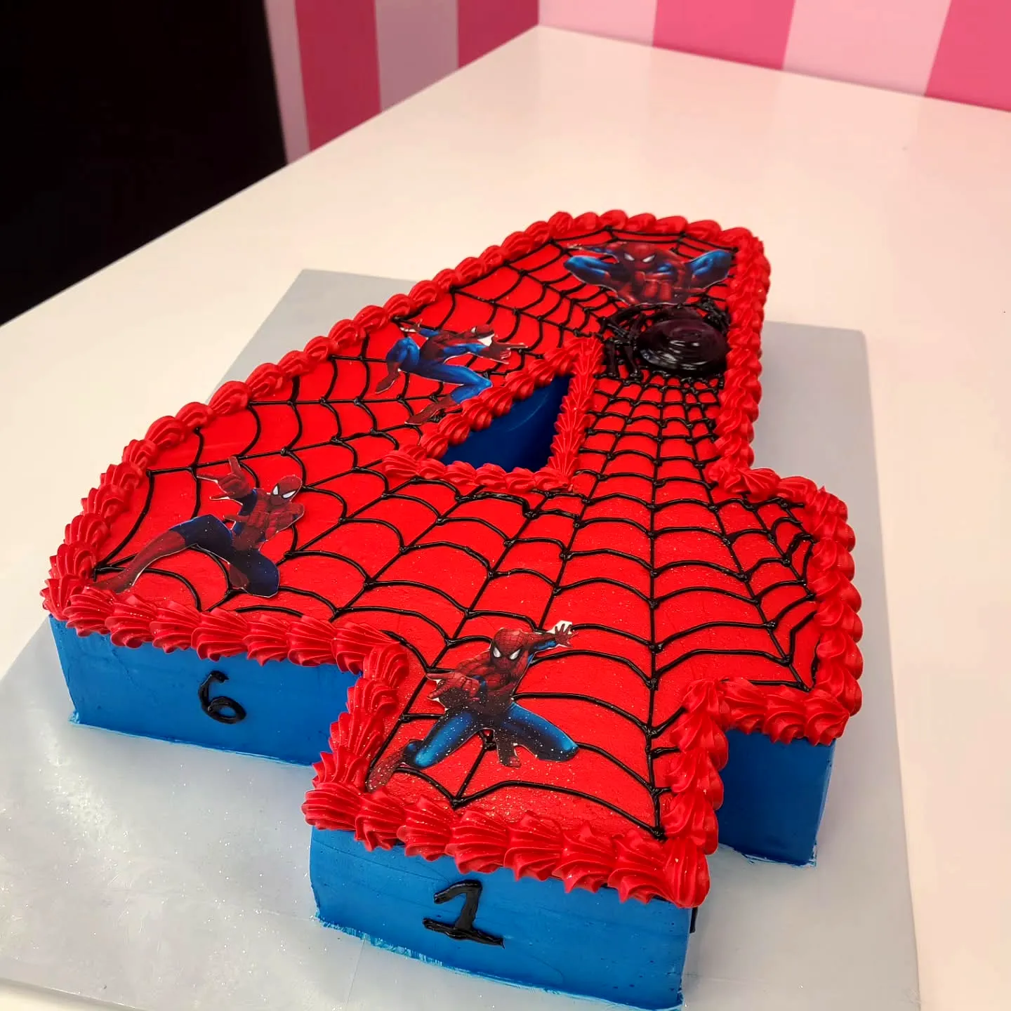 Creative Spiderman Birthday Cake Design with Fun Spiderweb Decorations
