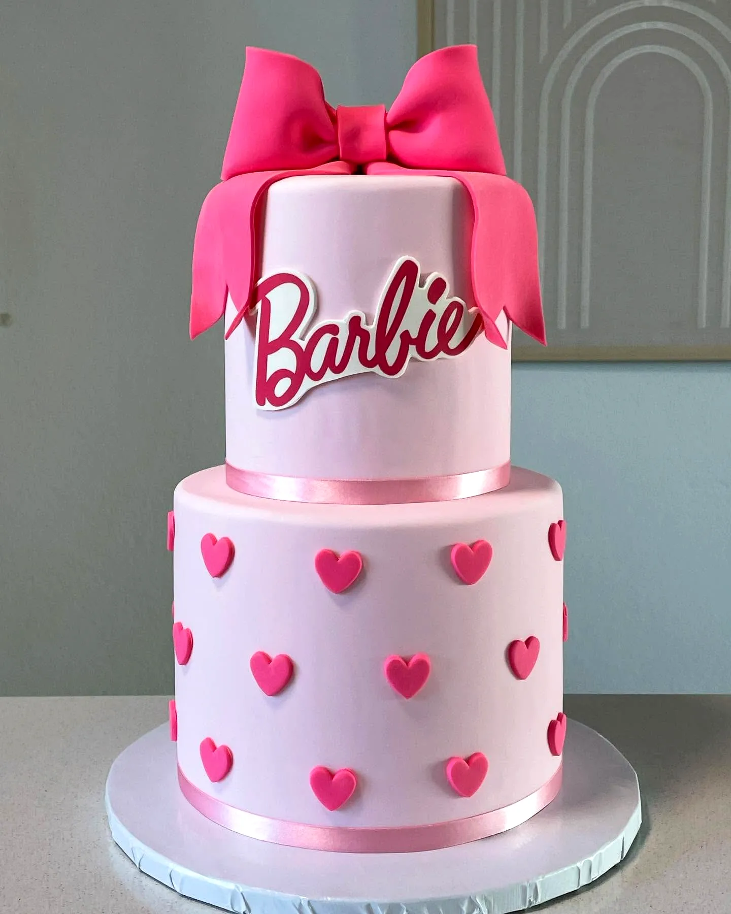 Cute Barbie Birthday Cake Design in Pink with Fun Decorations