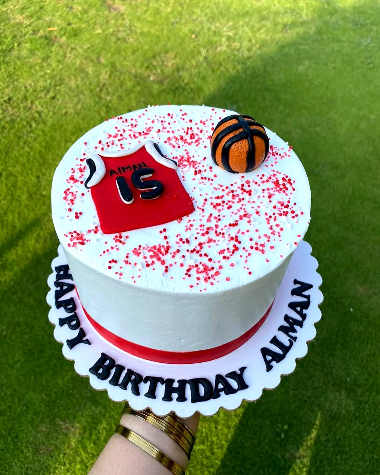 Cute basketball birthday cake design with vibrant colors and fun decorations