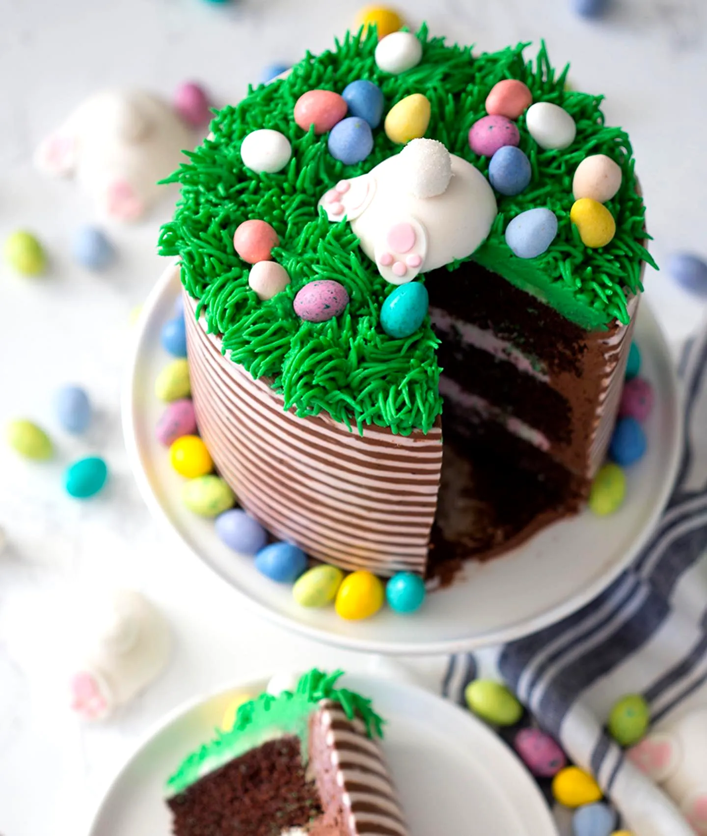 Cute Buttercream Easter Cake Design with Colorful Decorations and Whimsy
