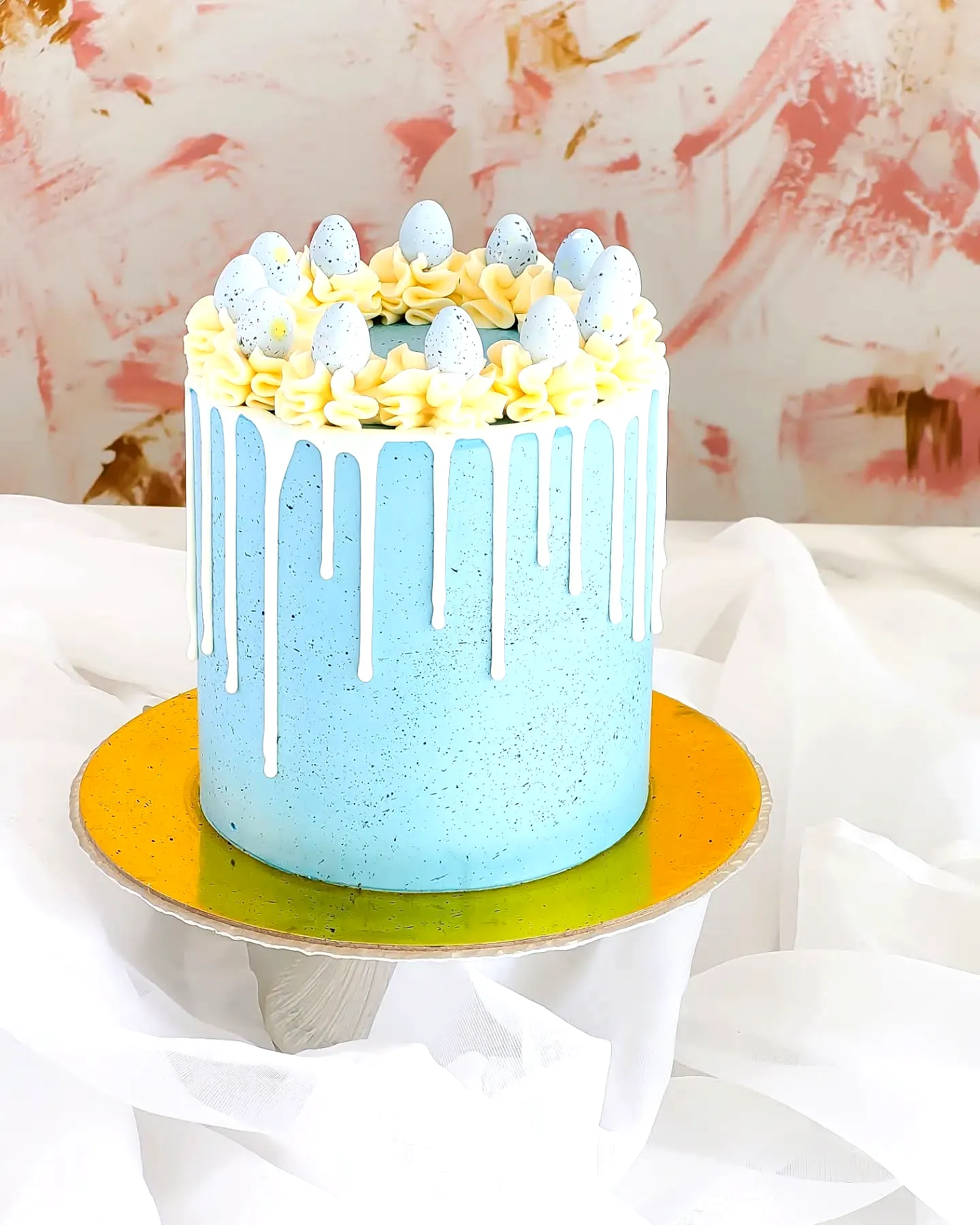 Cute buttercream Easter cake design with pastel colors and fun decorations