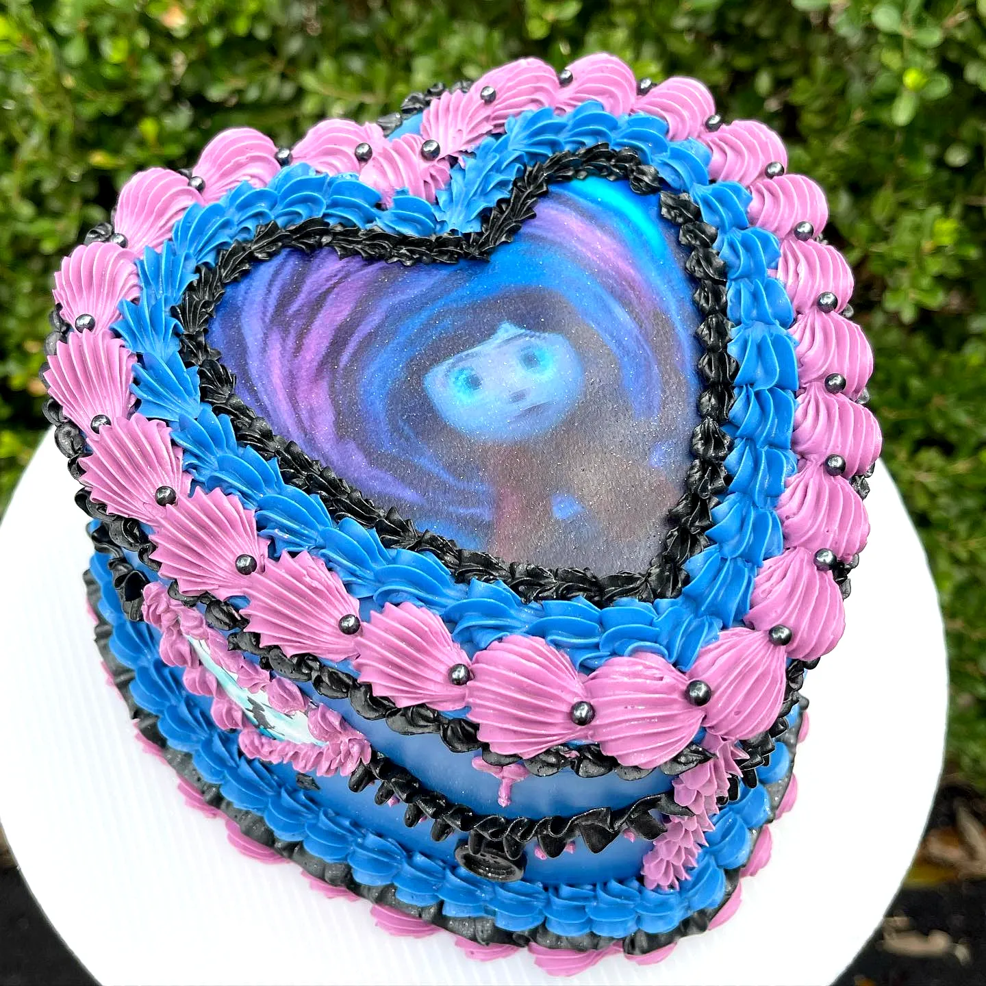 Cute Coraline Birthday Cake with Vibrant Colors and Fun Decorations