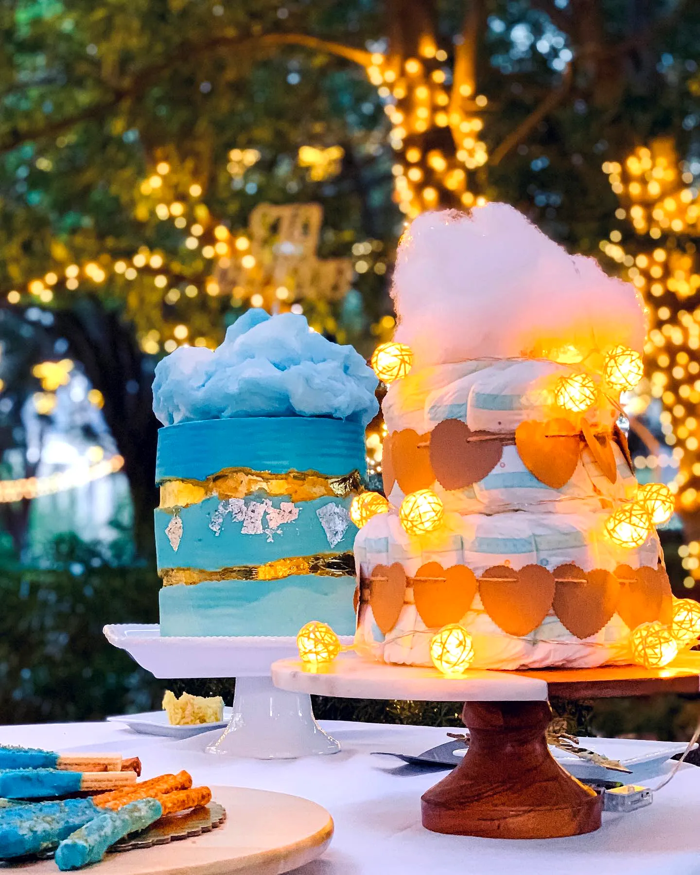Cute diaper cake design in whimsical pastel and blue cloud theme