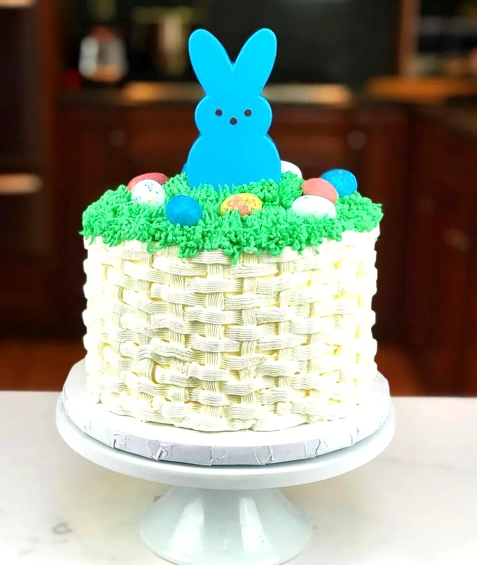 Cute Easter basket cake design with colorful frosting and playful decorations
