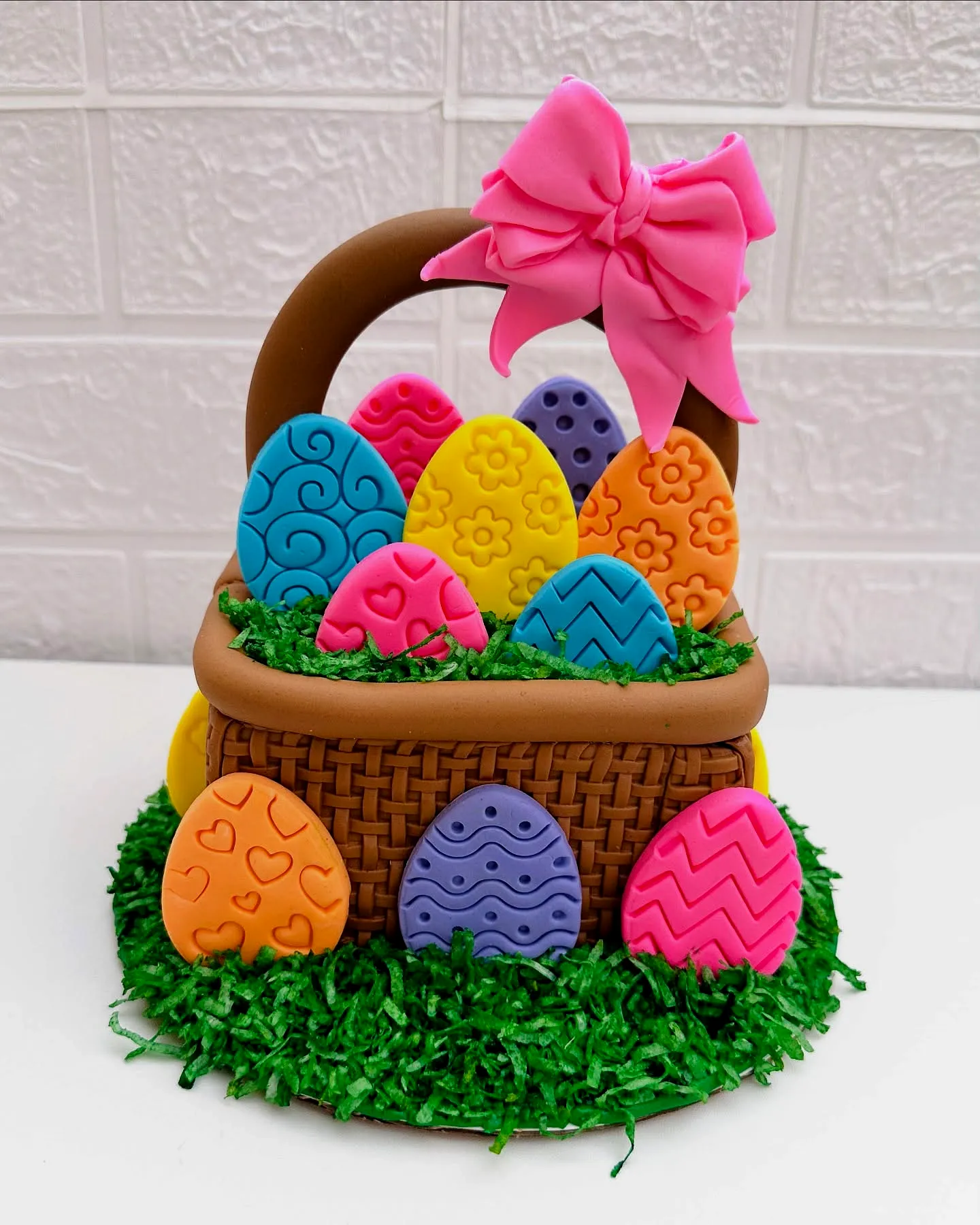 Cute Easter basket cake design with vibrant colors and fun decorations