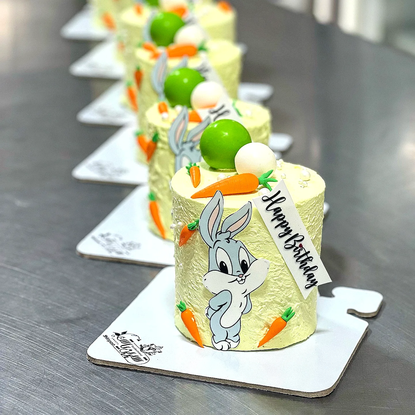Cute Easter Birthday Cake with Cartoon Theme and Playful Decorations