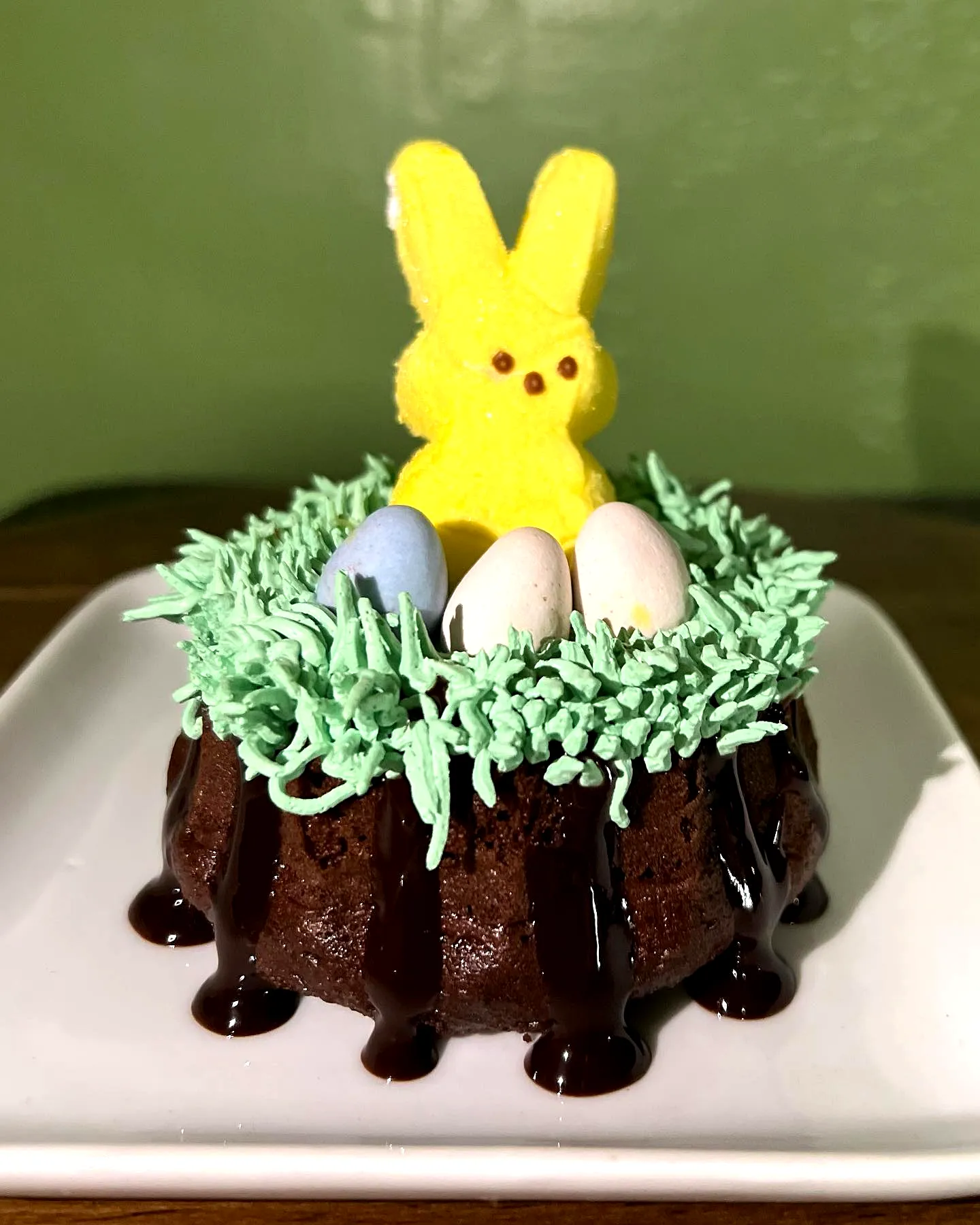 Cute Easter Bundt Cake Design with Vibrant Frosting and Colorful Decorations