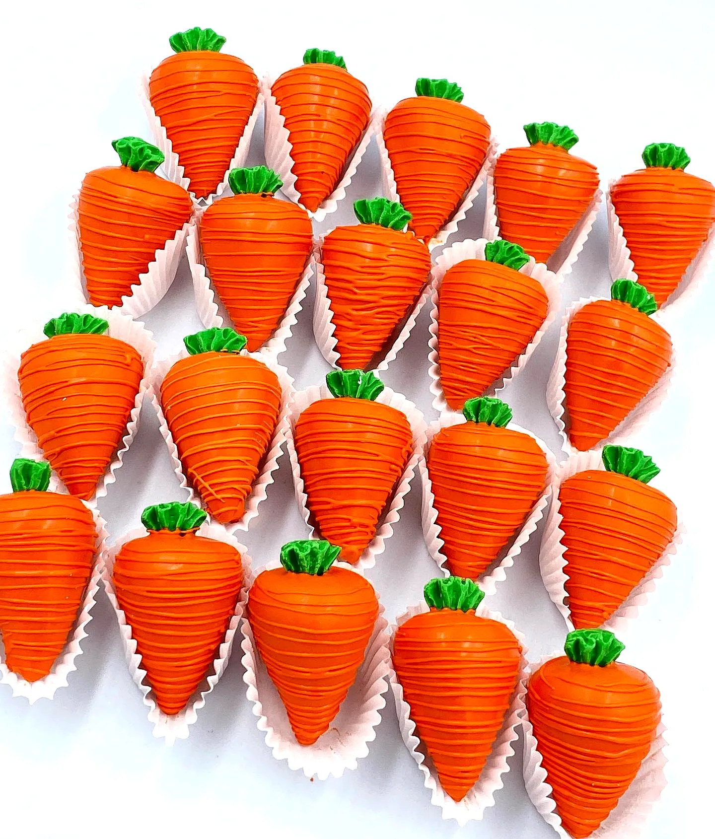 Cute Easter cake pop design featuring vibrant carrot shapes and fun textures