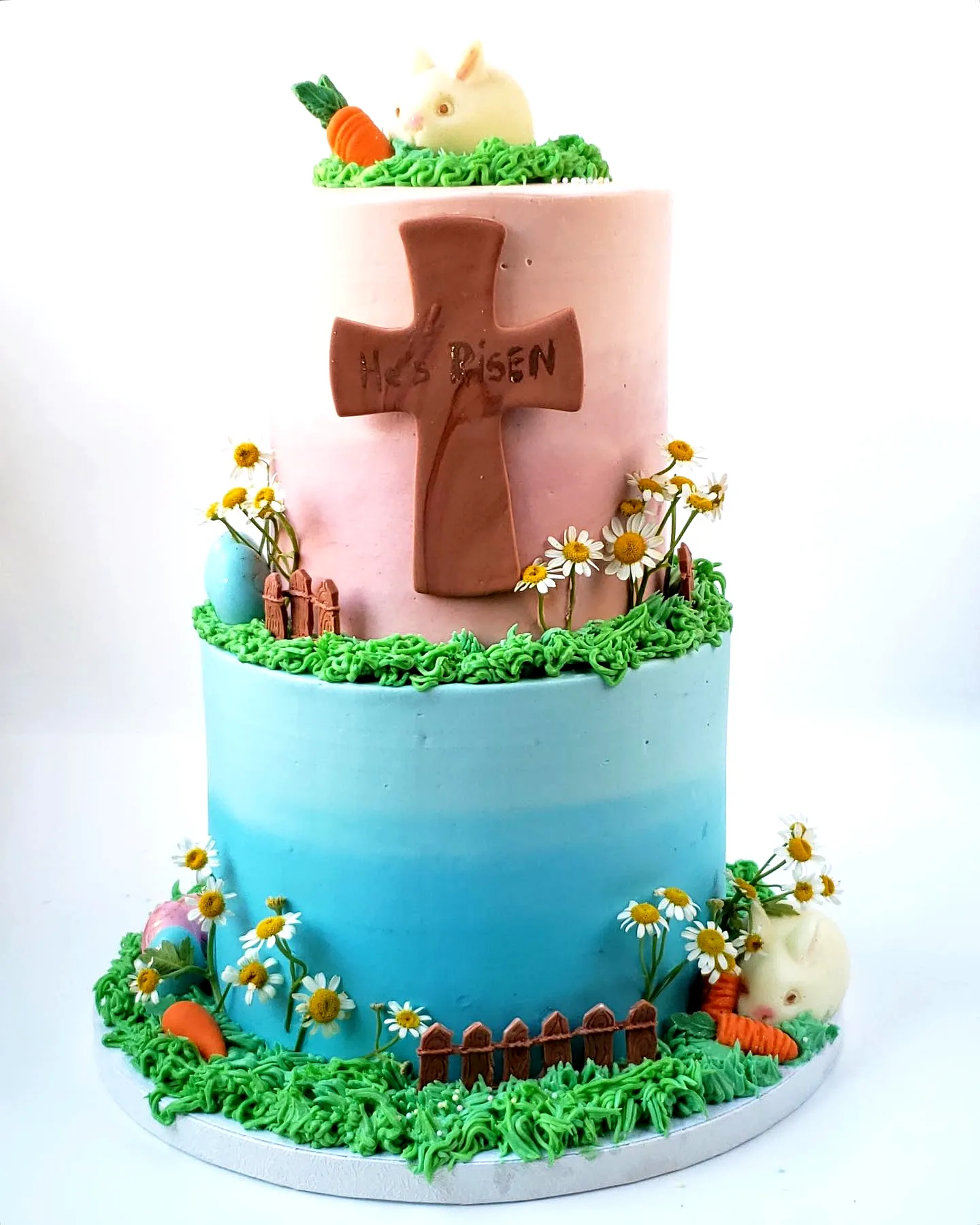 Cute Easter Cross Cake Design in Pastel Colors with Fun Decorations