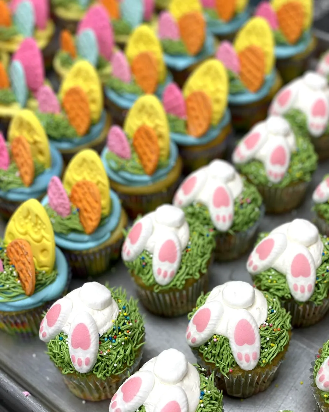 Cute Easter cupcake cake design with vibrant colors and playful decorations