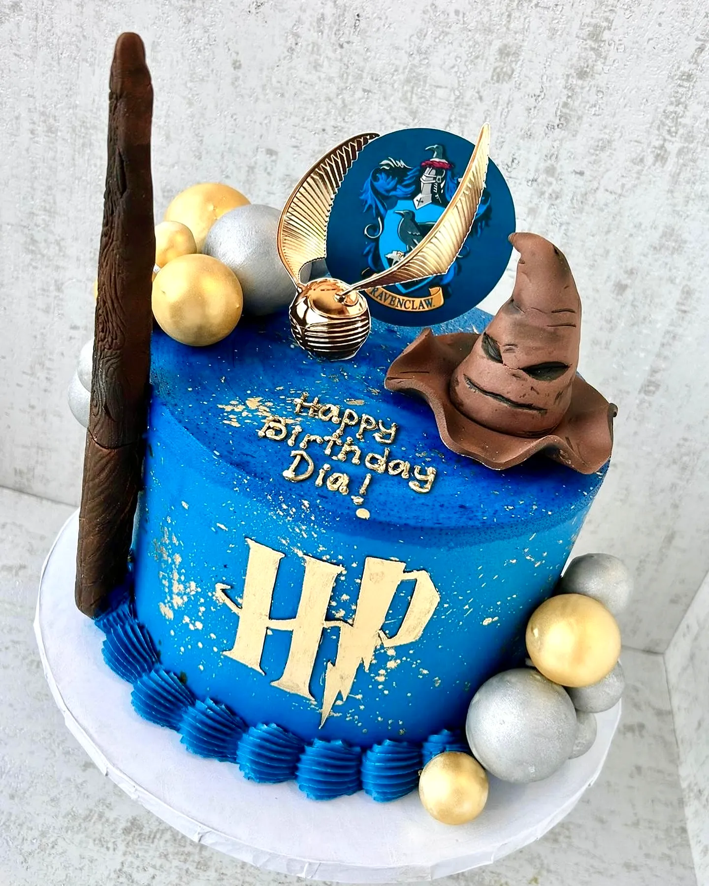 Cute Harry Potter Birthday Cake with Blue Ombre Buttercream and Fun Decorations