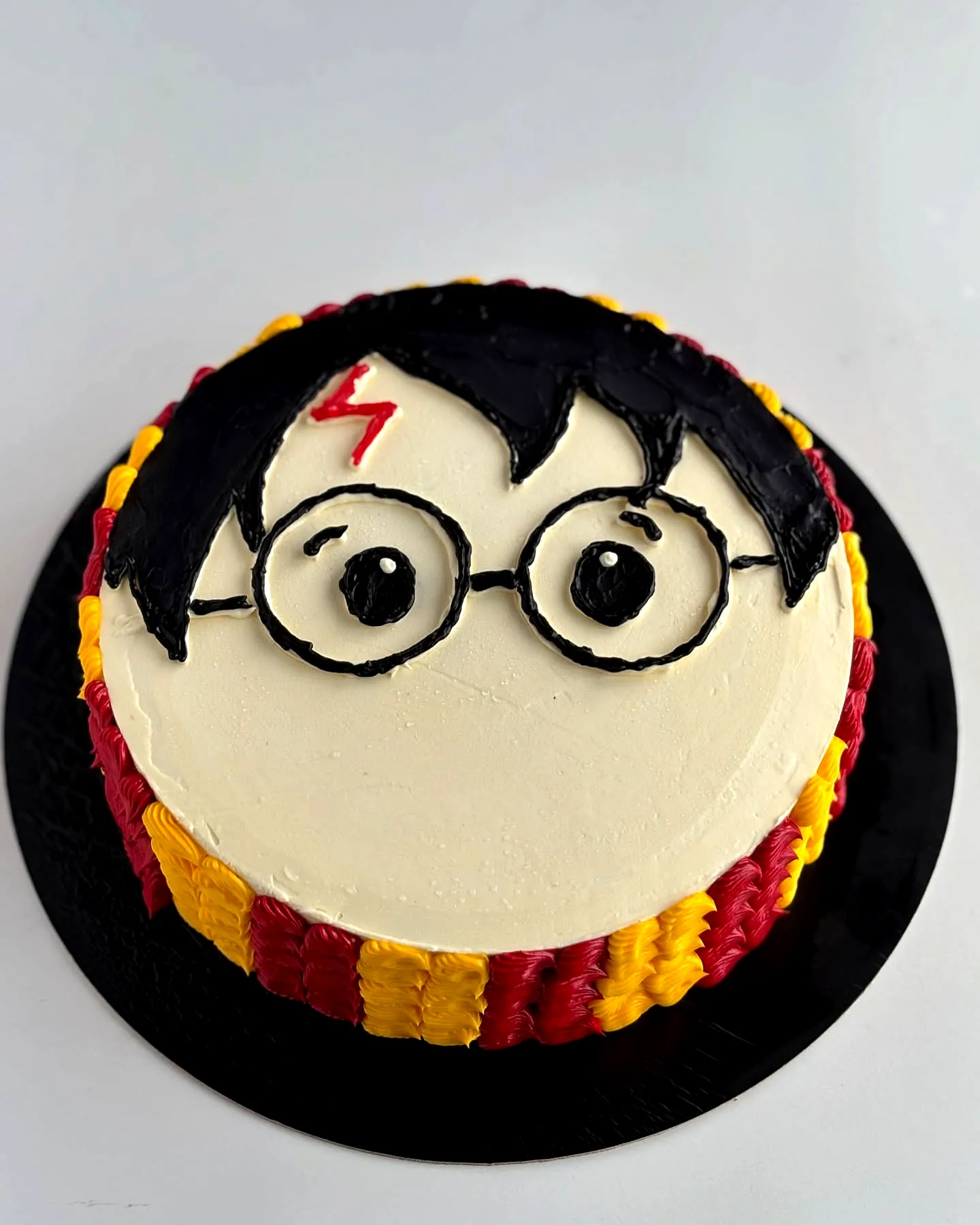 Cute Harry Potter cake design with colorful frosting and fun decorations