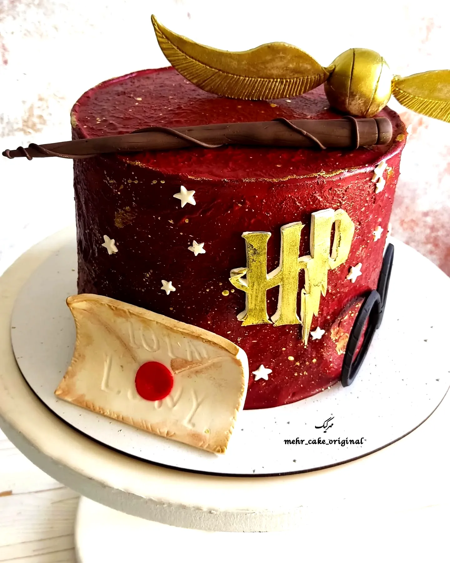 Cute Harry Potter cake design with red velvet and magical decorations