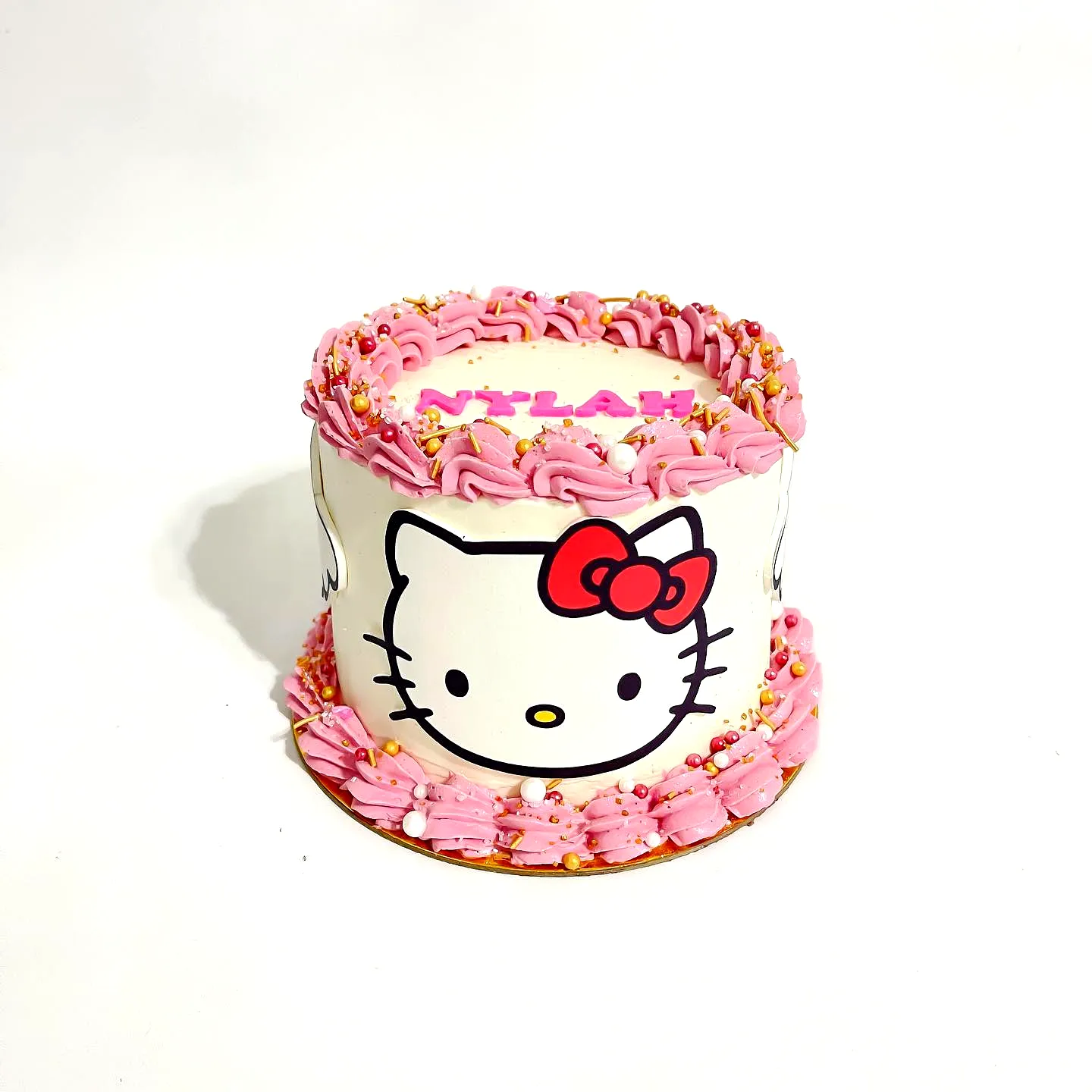 Cute Hello Kitty Cake for a Colorful Birthday Celebration