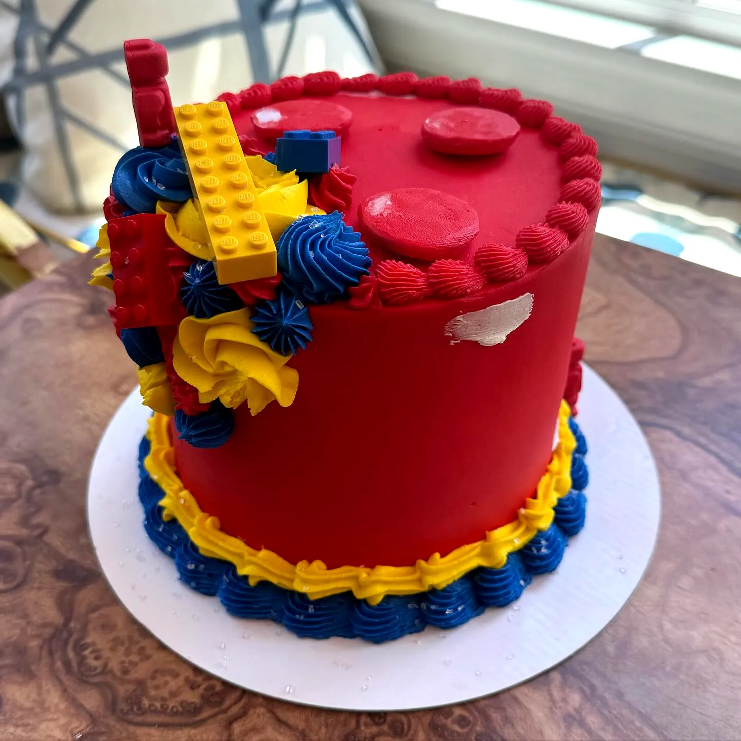 Cute lego birthday cake design with colorful frosting and playful decorations