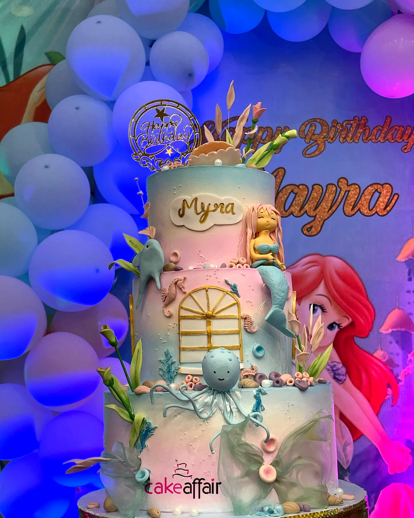 Cute mermaid birthday cake design with pastel underwater themes and decorations