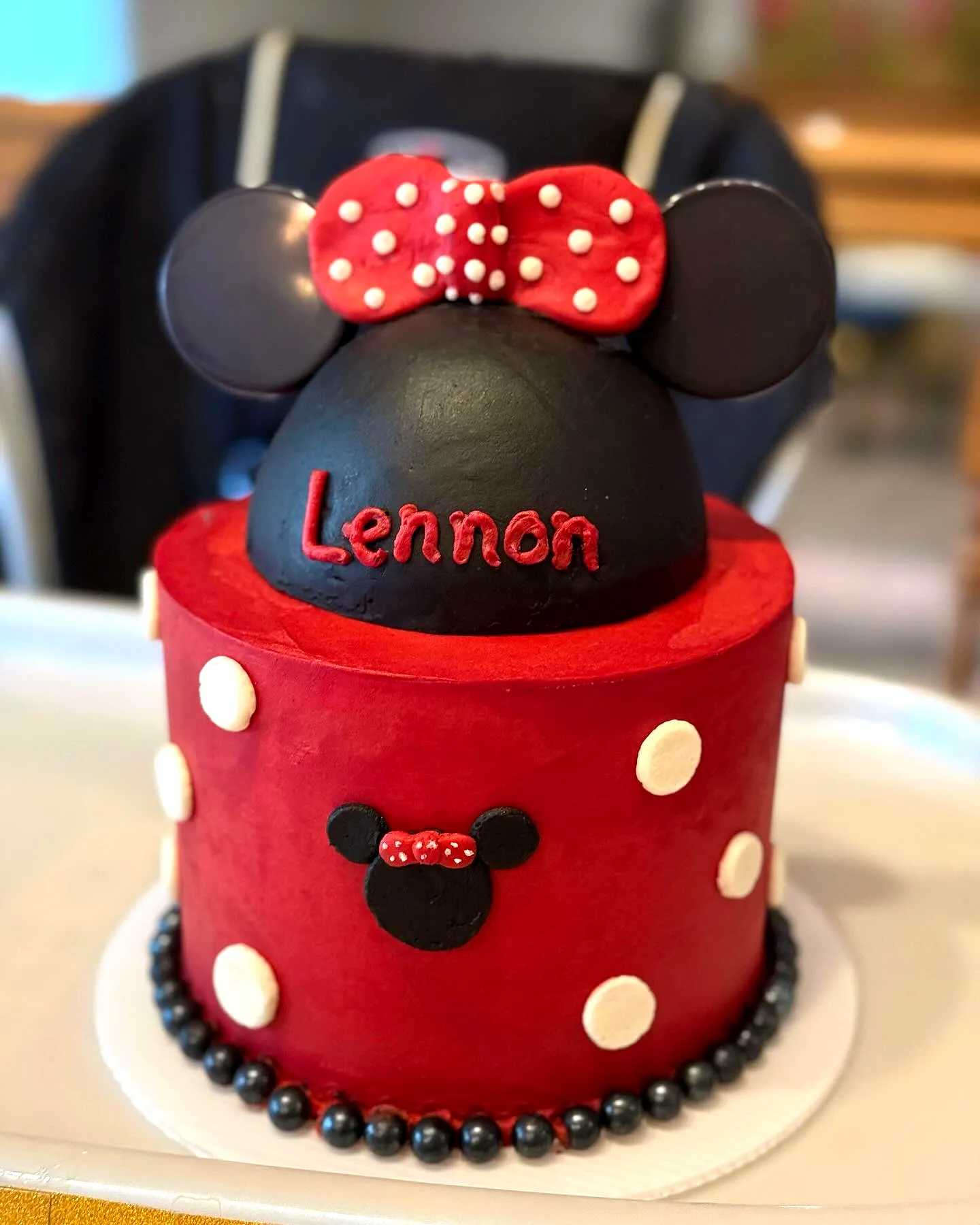 Cute Minnie Mouse Birthday Cake Design with Red Fondant and Polka Dots