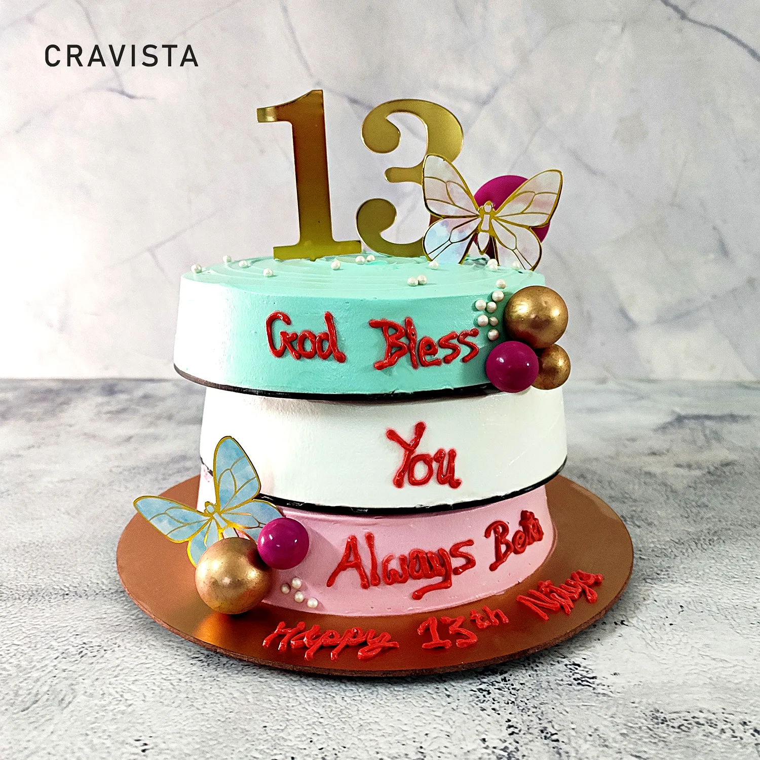 Cute modern 13th birthday cake with vibrant colors and fun decorations