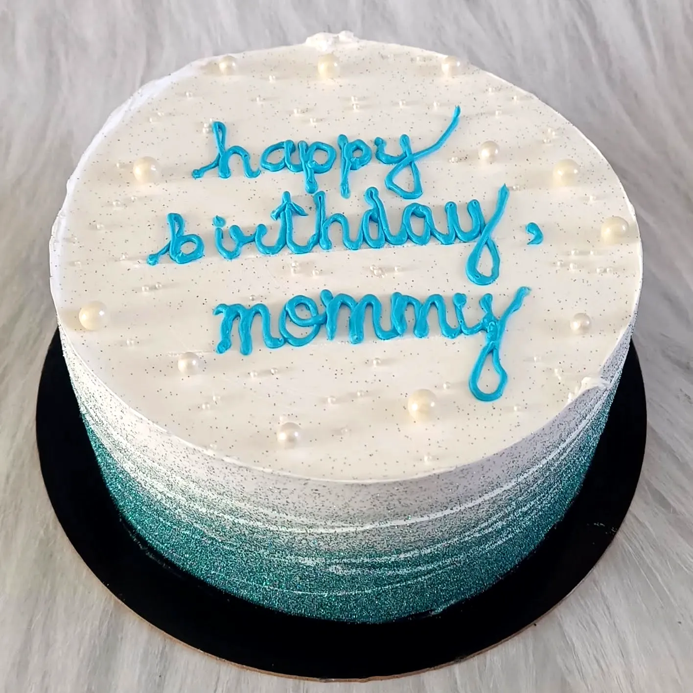 Cute ombre mother birthday cake with sparkling glitter and elegant decoration