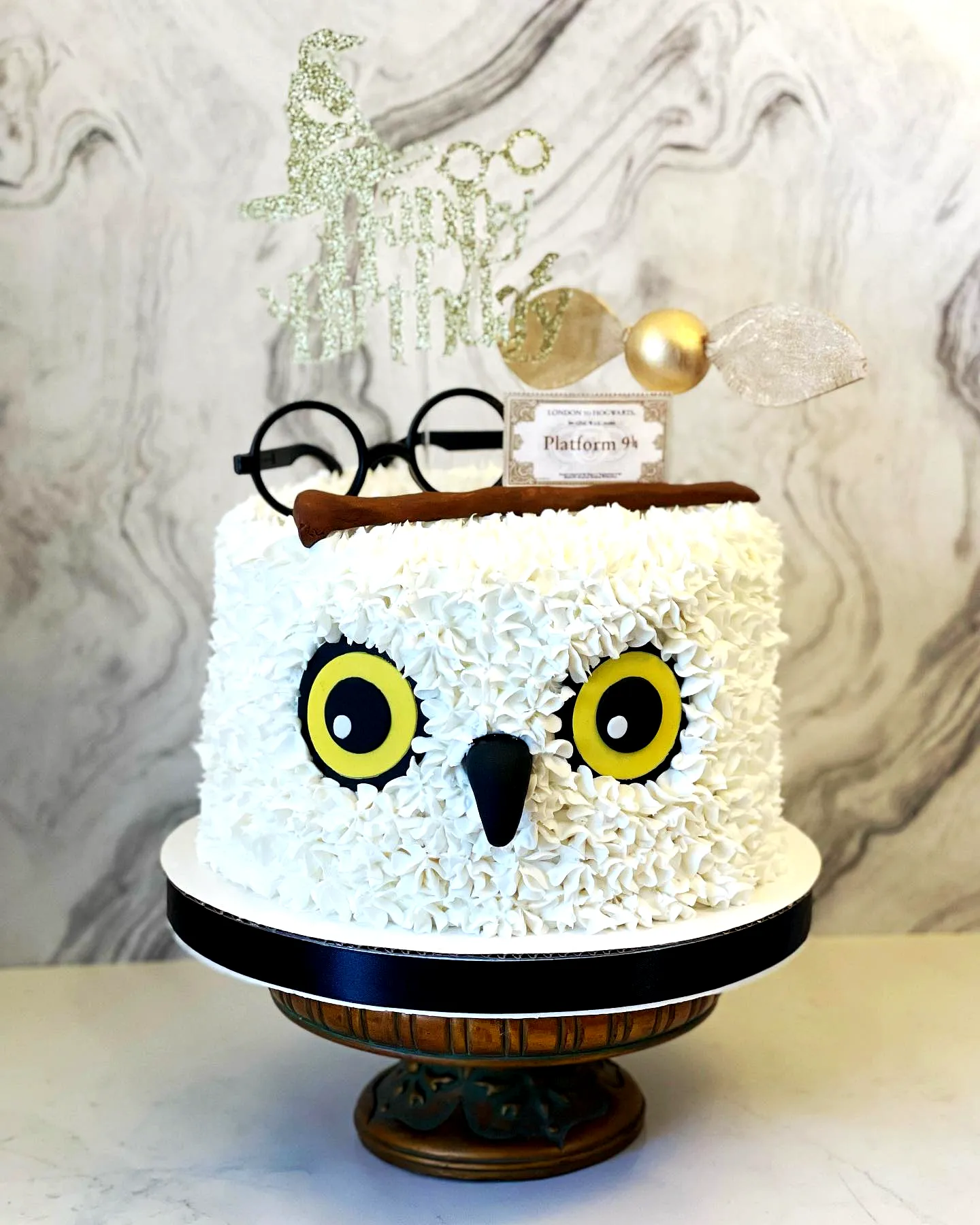Cute owl cake design for magical Harry Potter birthday celebration