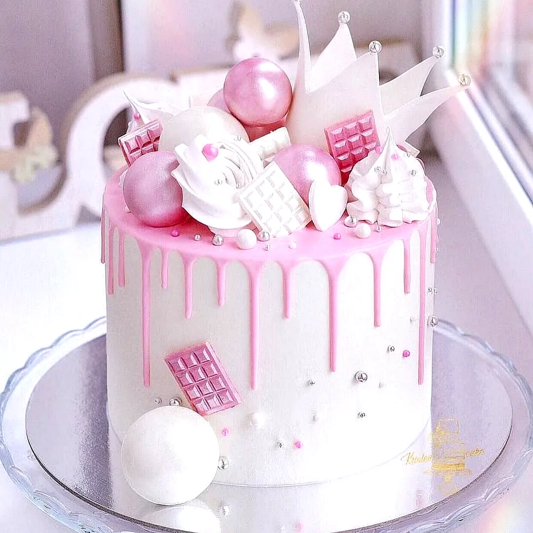 Cute Pink Birthday Cake Design with Whimsical Drip and Stylish Decorations