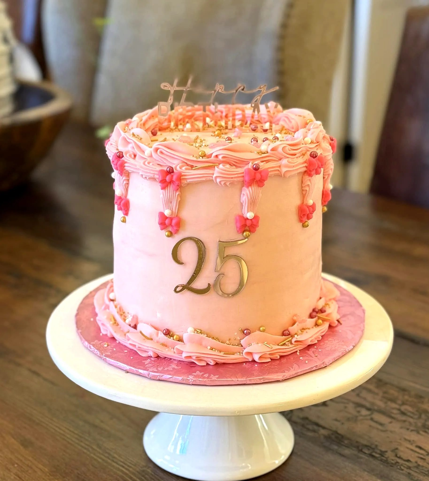 Cute pink buttercream cake for 25th birthday celebration