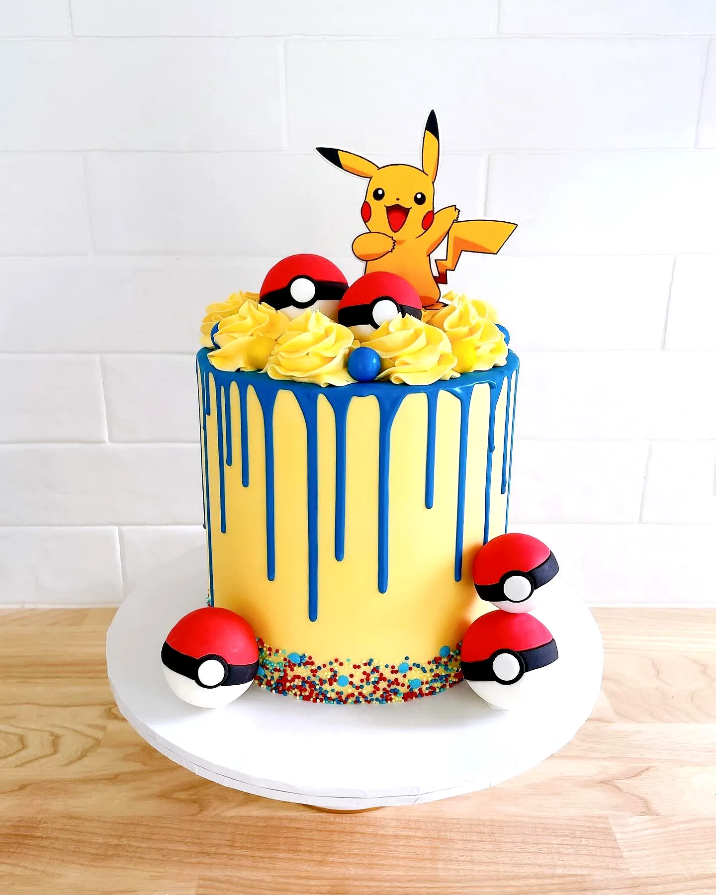 Cute Pokemon Birthday Cake Design with Colorful Buttercream and Fun Decorations