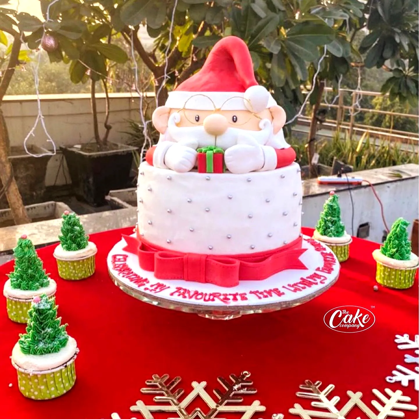 Cute Santa Claus Christmas birthday cake design for festive celebrations