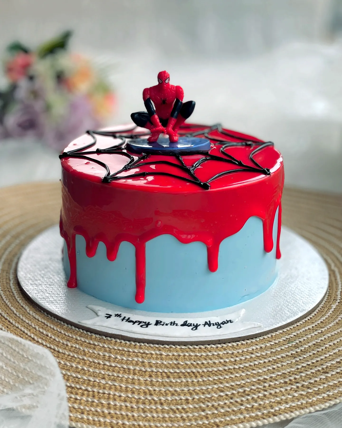 Cute Spiderman Birthday Cake Design with Colorful Drip and Spider Web Pattern
