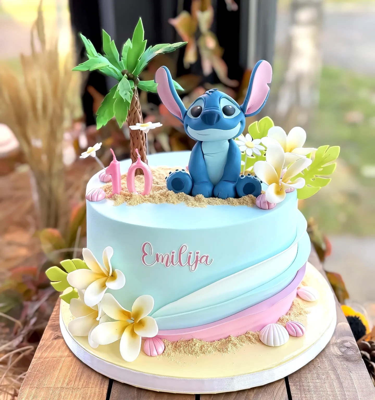 Cute Stitch Cake Design with Tropical Colors and Whimsical Decorations