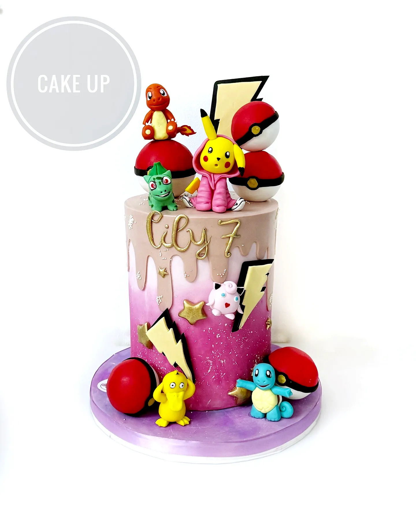 Cute Two-Tiered Pokemon Cake Design in Trendy Pink and Lavender Colors