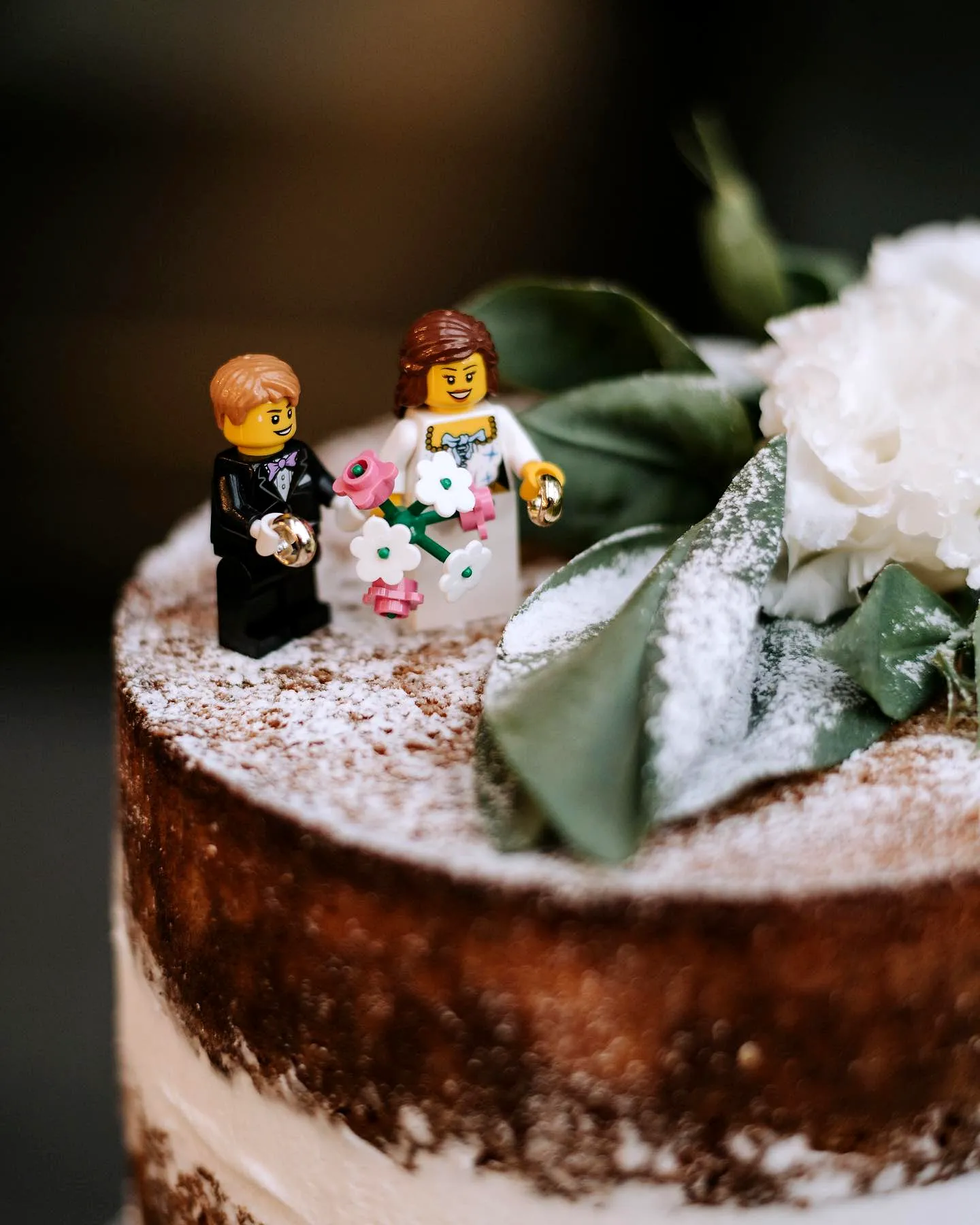 Cute wedding cake topper for a trendy rustic multi-layered cake