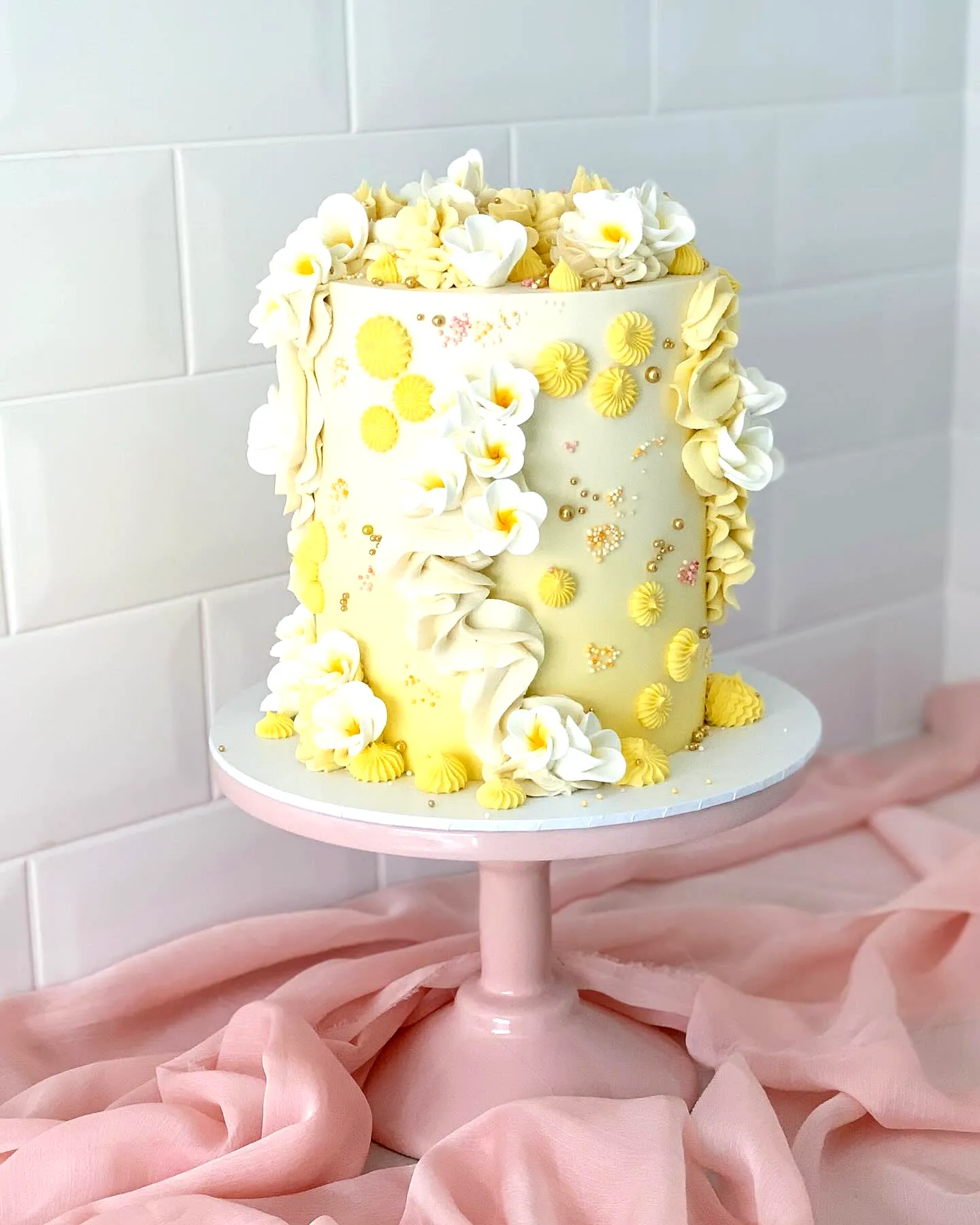 Delightful Yellow Birthday Cake Design with Ruffles and Flowers