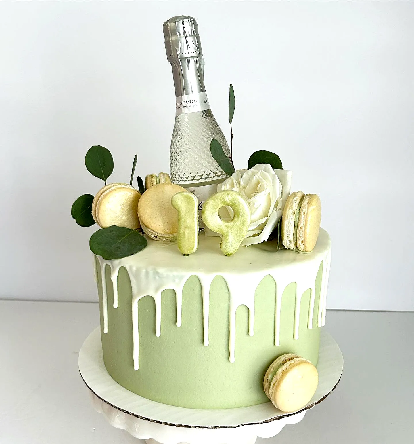 Elegant 19th Birthday Cake in Modern Style with Green Fondant and Golden Accents