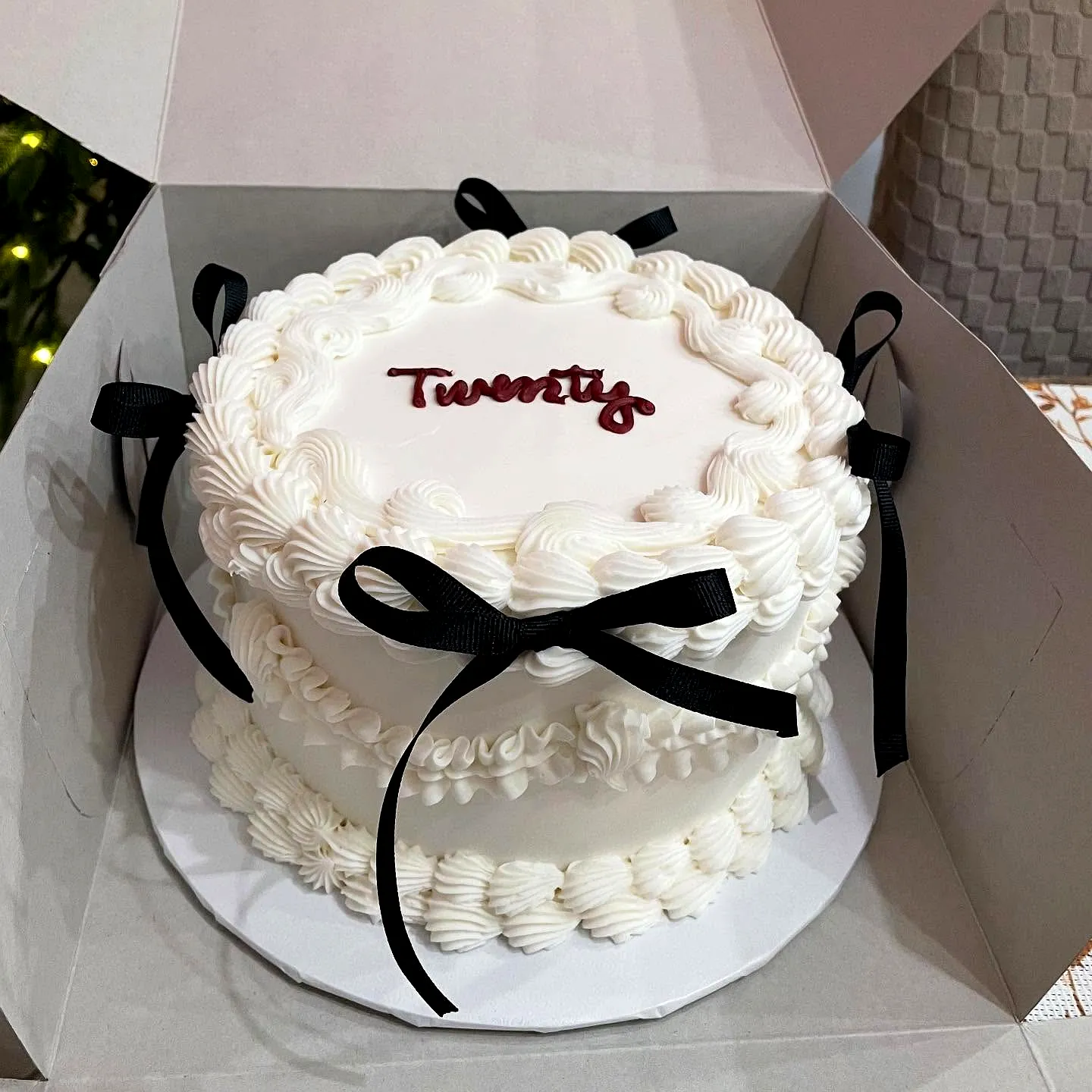 Elegant 20th Birthday Cake Design with Smooth Buttercream and Piping