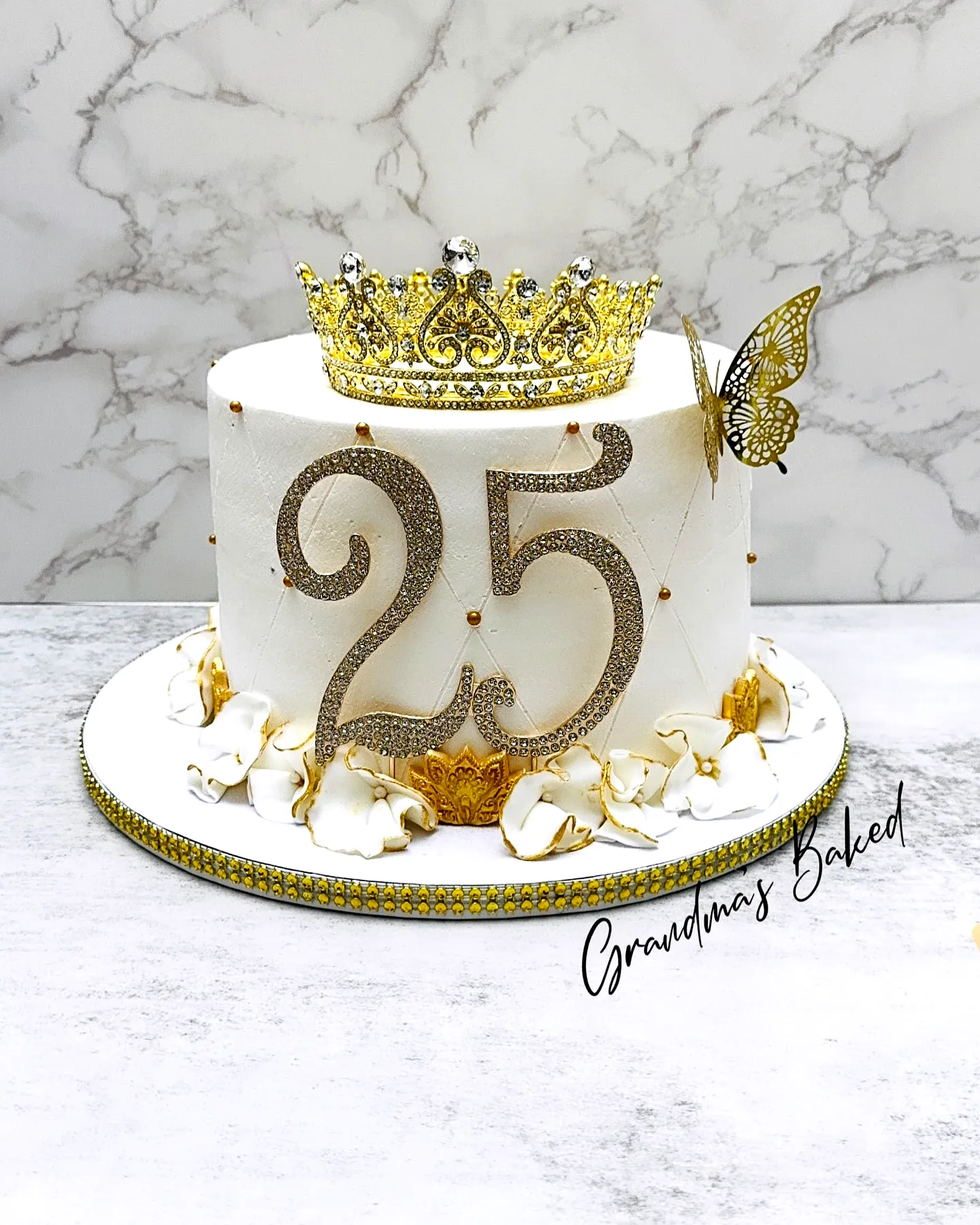 Elegant 25th Birthday Cake Design with Royal Accents and Floral Touches