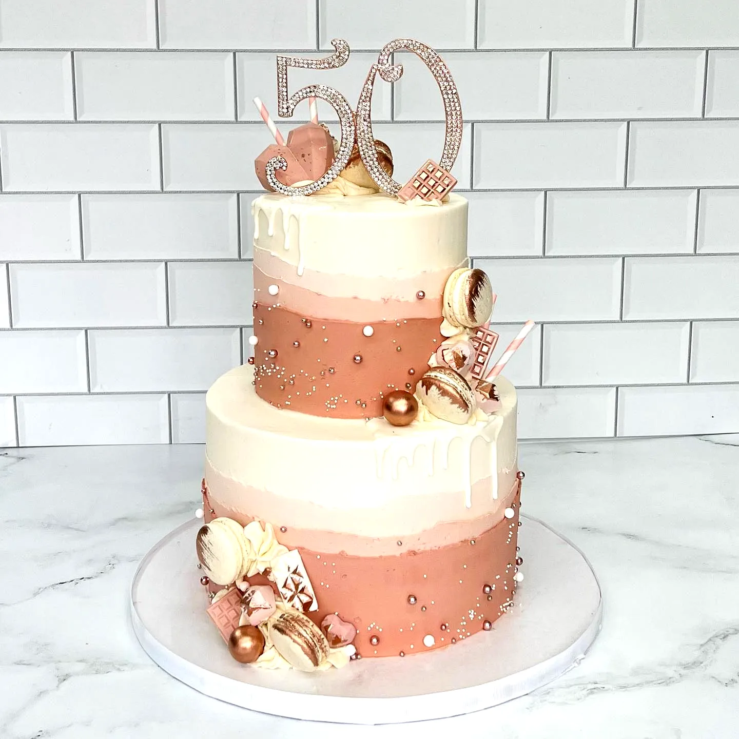 Elegant 50th Birthday Cake for Women in Soft Peach and Cream Colors