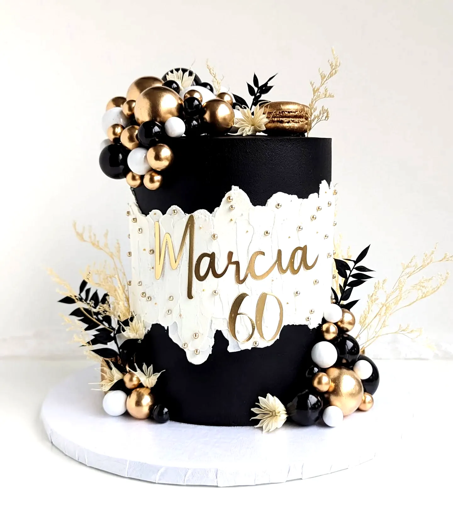 Elegant 60th Birthday Cake Design with Gold Accents and Textured Details