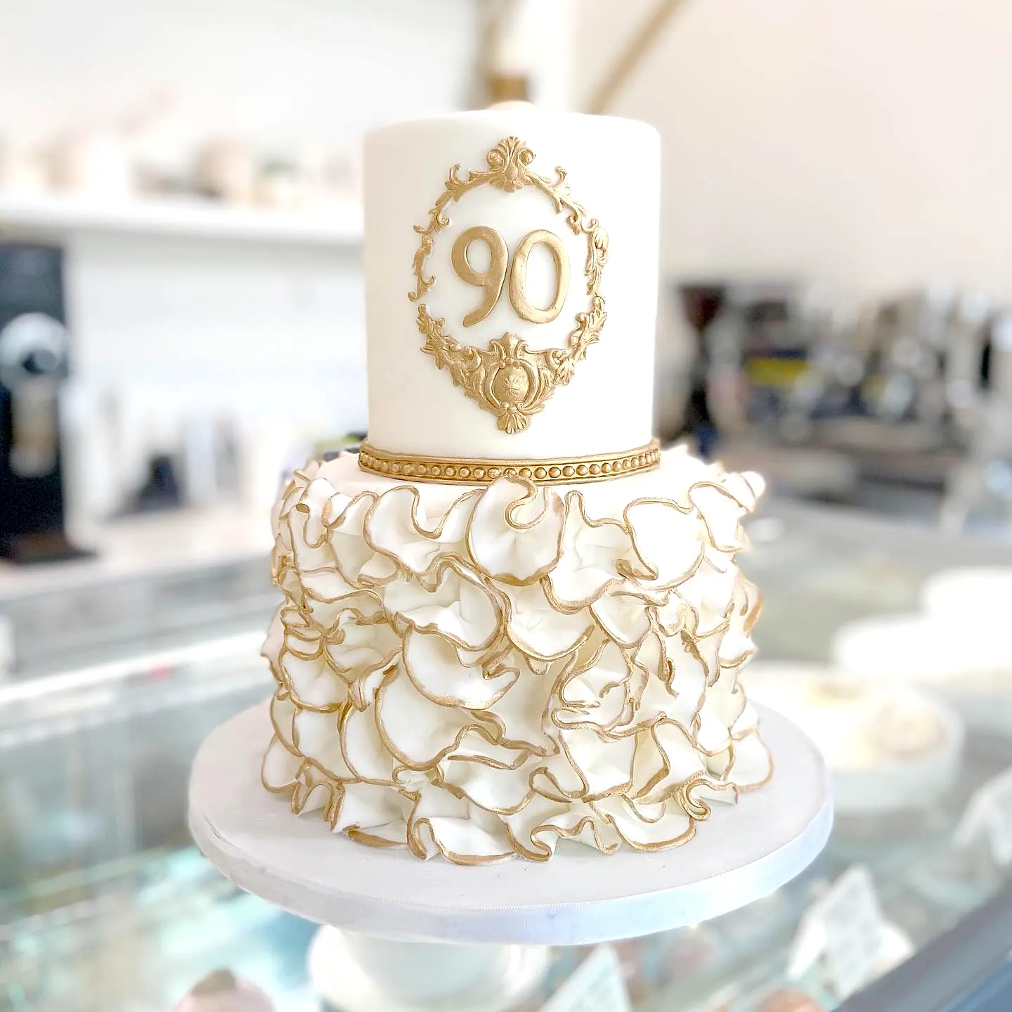Elegant 90th Birthday Cake Design with Intricate Gold Detailing