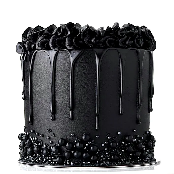 Elegant Black Birthday Cake Design with Glossy Ganache and Ruffled Frosting