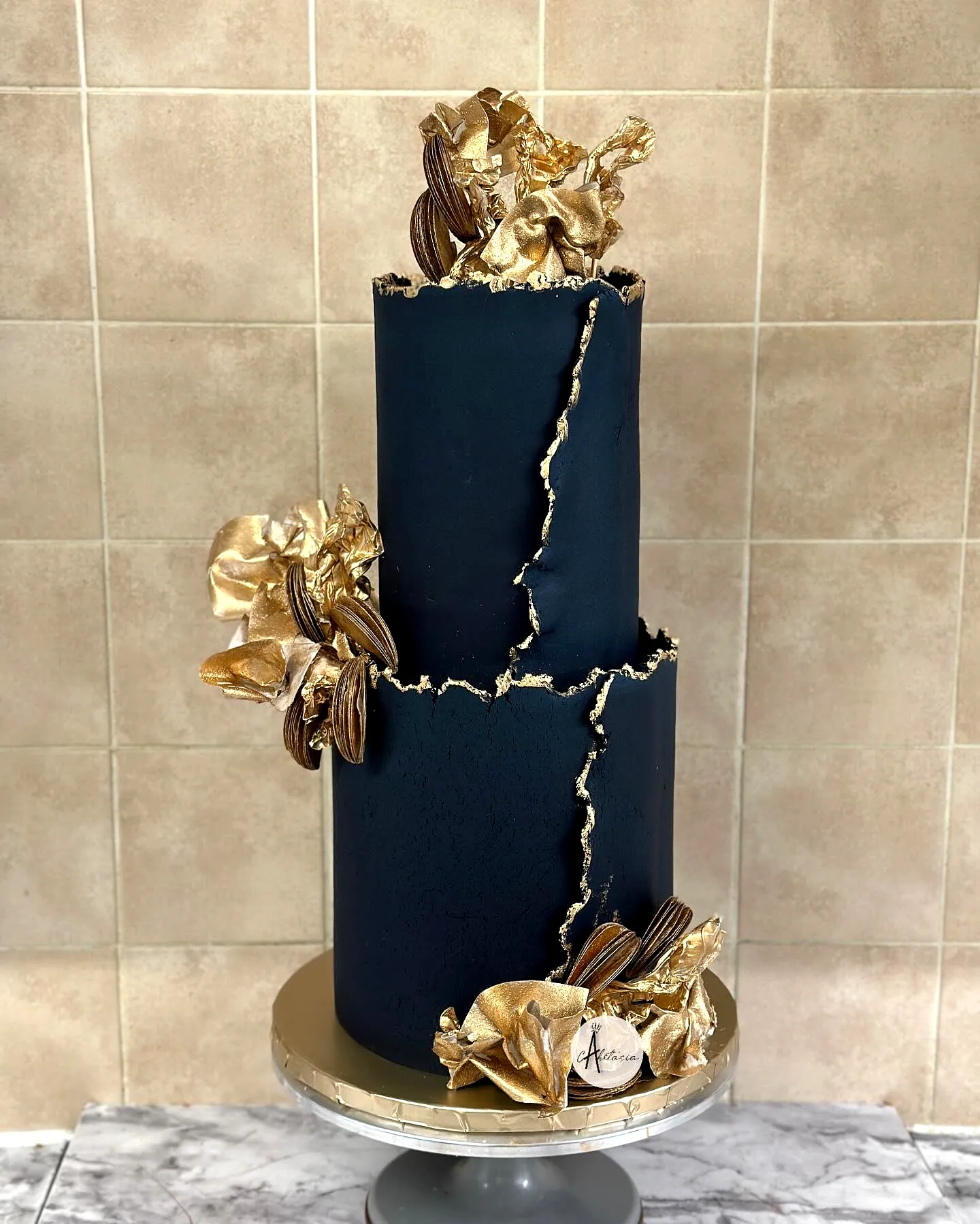 Elegant Black Birthday Cake Design with Modern Textures and Gold Accents