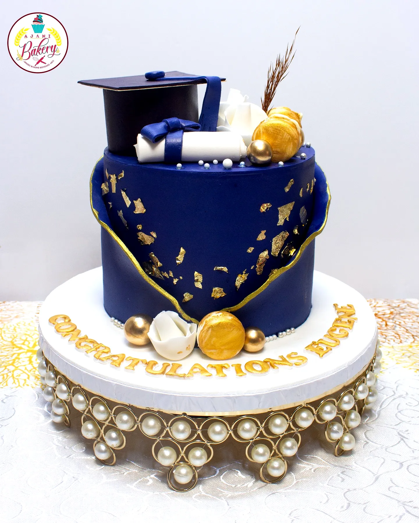 Elegant Blue and Gold Graduation Cake for a Stunning Celebration
