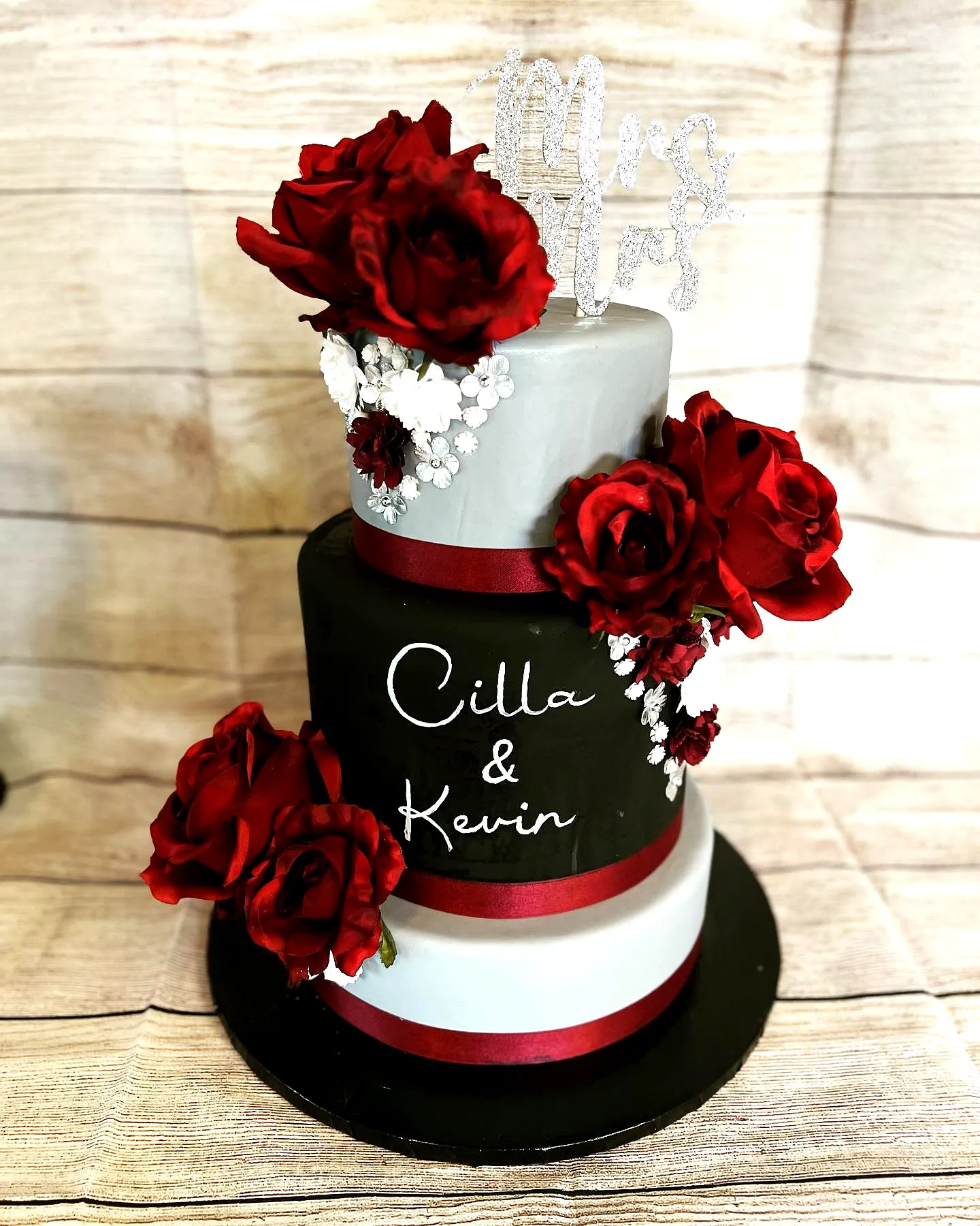 Elegant Burgundy Wedding Cake Design with Romantic Flourishes