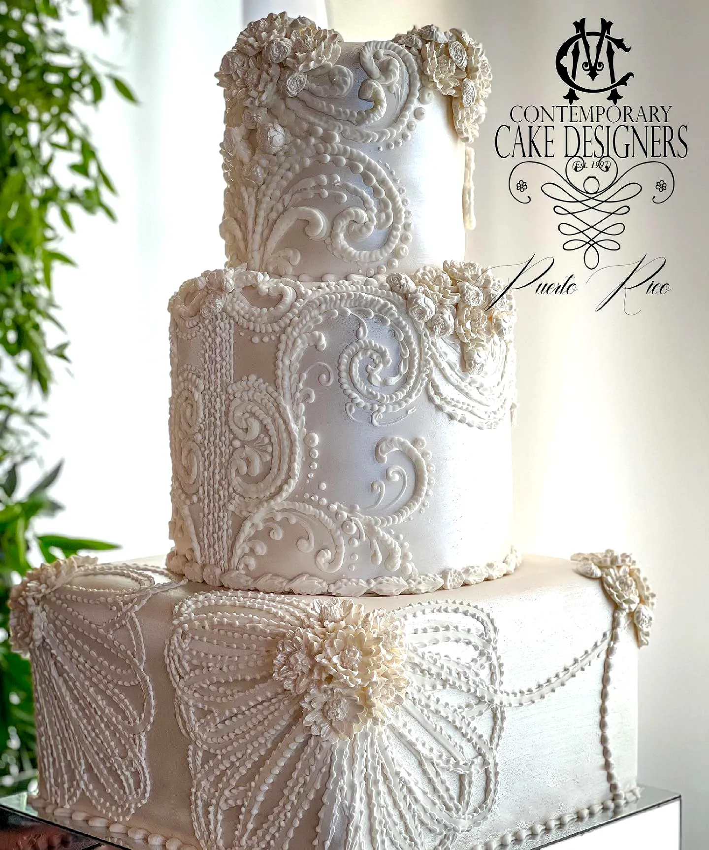 Elegant Contemporary Wedding Cake Design with Intricate Floral Details