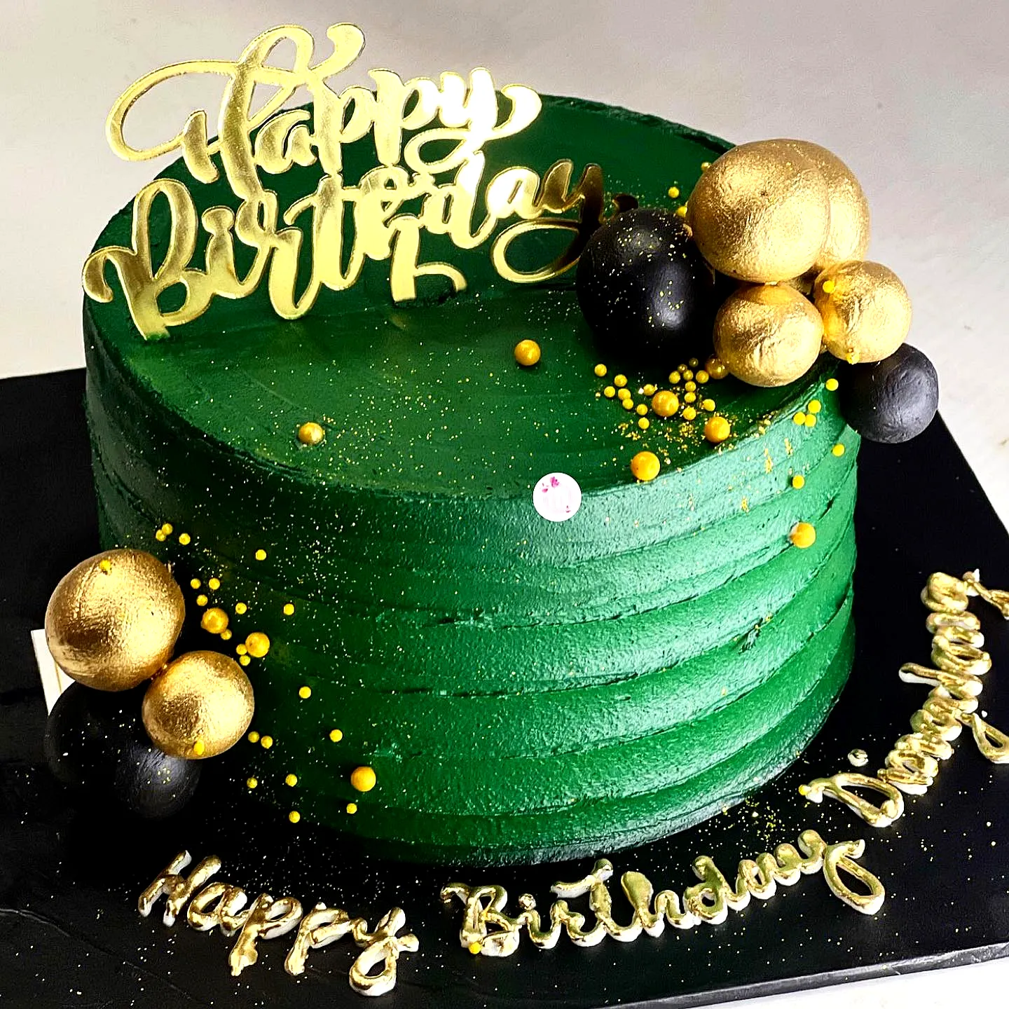 Elegant Green Birthday Cake for a Festive Celebration